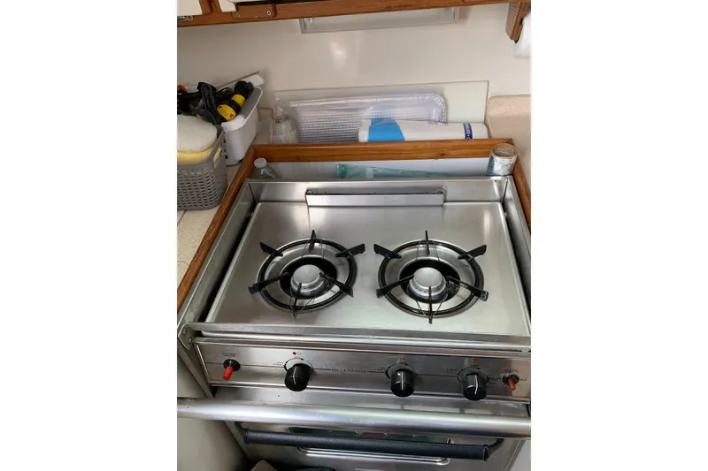 Slide: The Image of Stainless steel stove in a 1998 Catalina 320 yacht kitchen. - 23