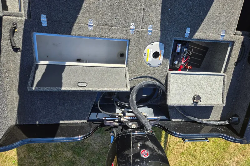 Slide: The Image of 2021 Crestliner 1850 Fish Hawk SC JS boat storage compartments and battery setup. - 24