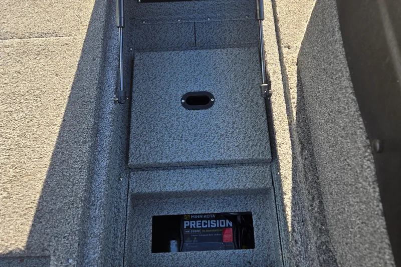 Slide: The Image of 2021 Crestliner 1850 Fish Hawk SC JS boat interior with Minn Kota Precision battery compartment. - 9