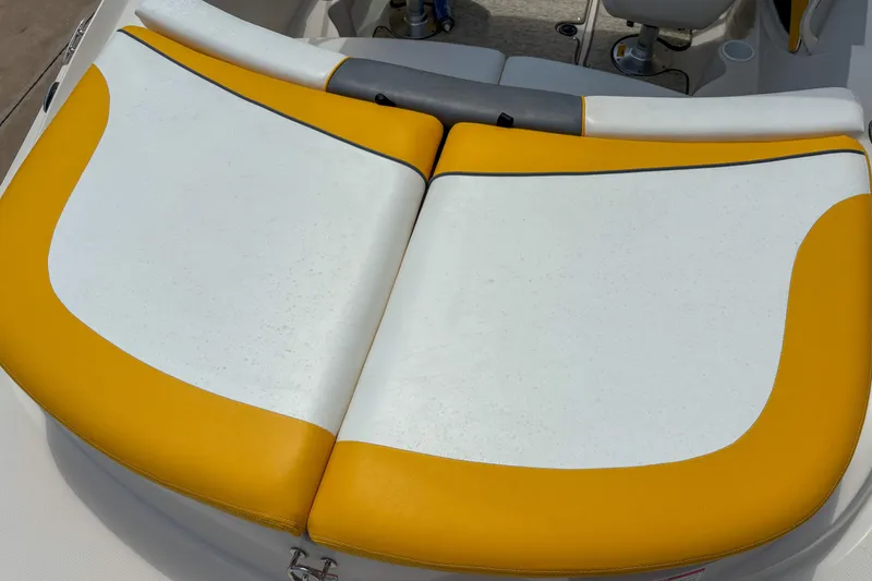 Slide: The Image of Yellow and white seating on a 2007 Sea Ray 195 Sport boat. - 6