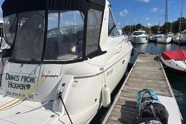 Slide: The Image of 2004 Cruisers Yachts 370 Express docked at marina, sunny day, Milwaukee, WI. - 23