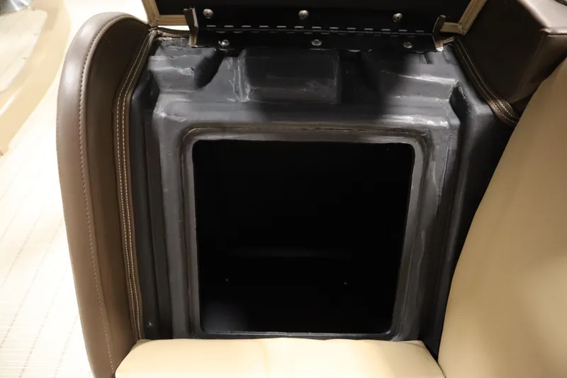 Slide: The Image of Open storage compartment in 2018 Lowe 230 Retreat WT boat seat. - 12
