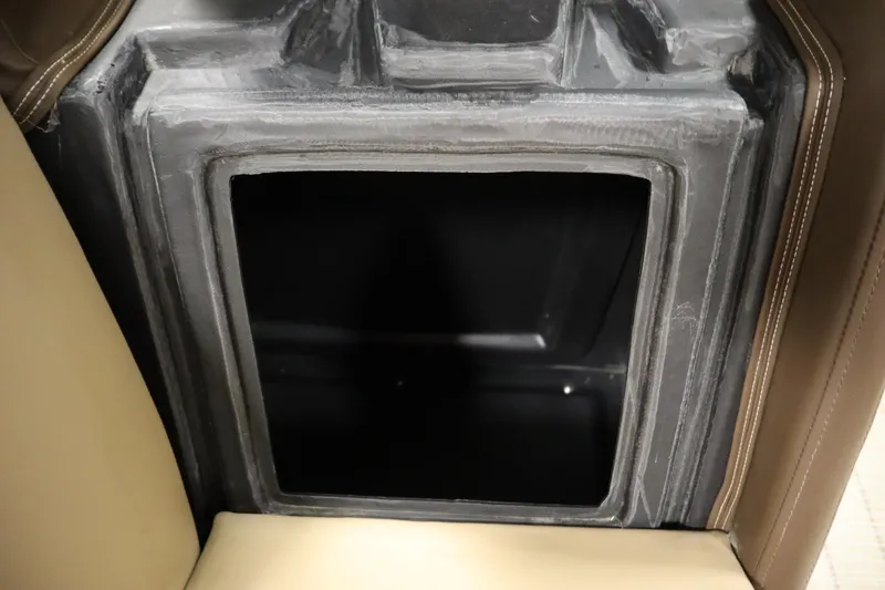 Slide: The Image of Storage compartment in 2018 Lowe 230 Retreat WT boat interior. - 32