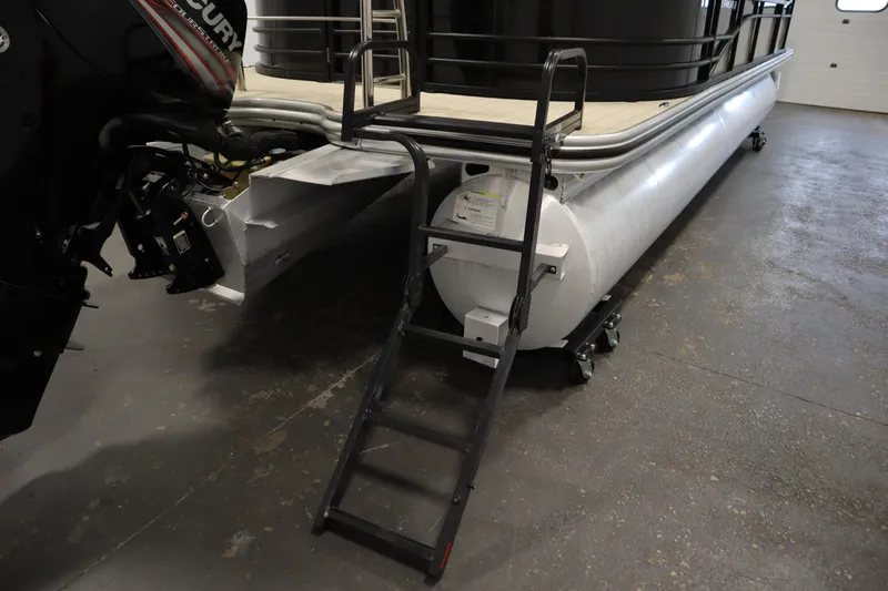 Slide: The Image of 2018 Lowe 230 Retreat WT pontoon boat with ladder and Mercury outboard motor. - 38