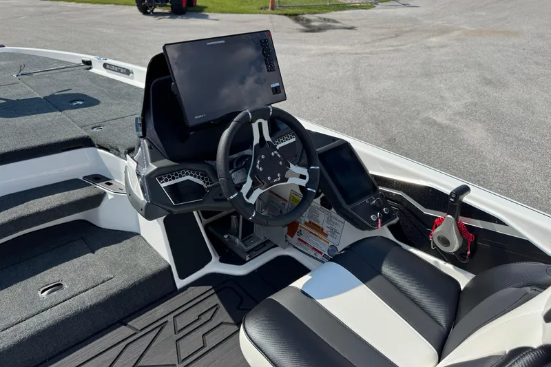 Slide: The Image of 2026 Skeeter FXR20 FLEX boat cockpit with advanced navigation system and sleek design. - 11