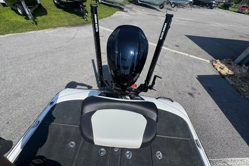 Slide: The Image of 2026 Skeeter FXR20 FLEX boat with Minn Kota motor, rear view. - 22