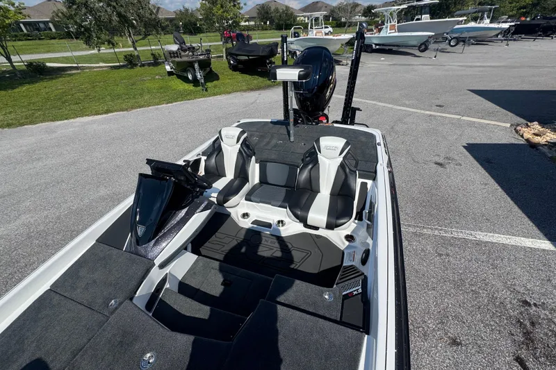 Slide: The Image of 2026 Skeeter FXR20 FLEX boat interior with dual seats and modern design. - 8