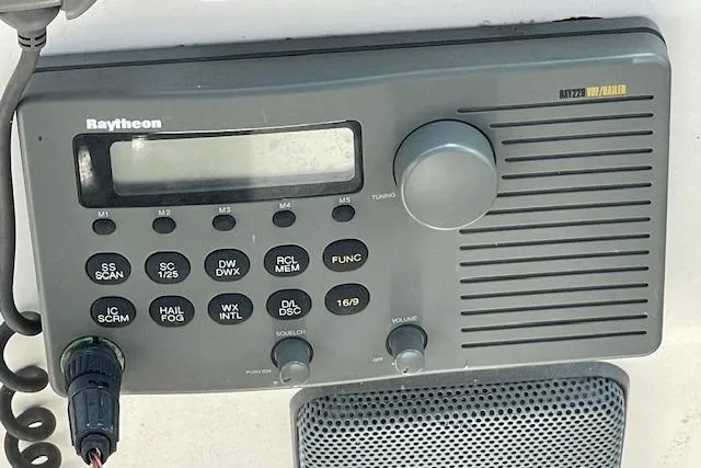 Slide: The Image of Raytheon marine radio on 2001 Sea Ray 420 Aft Cabin yacht dashboard. - 18