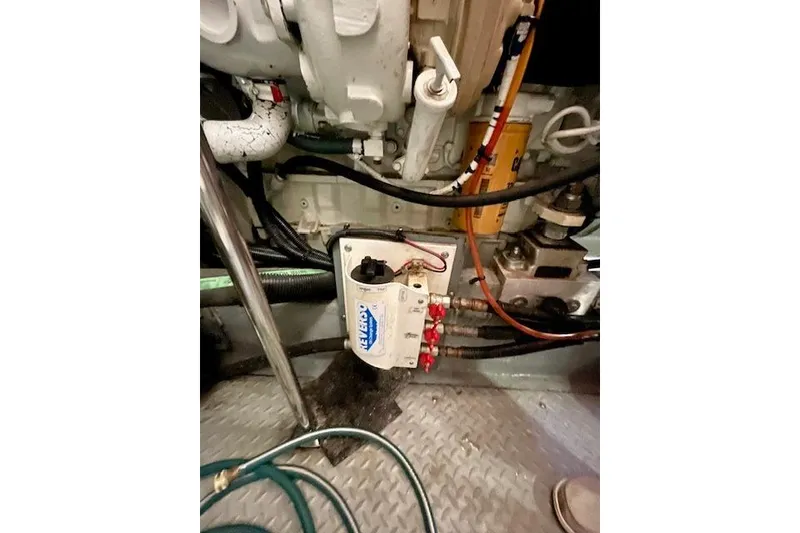 Slide: The Image of Engine room of 2001 Sea Ray 420 Aft Cabin with mechanical components and wiring. - 60