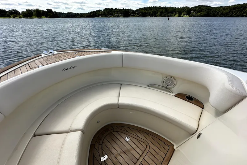 Slide: The Image of 2019 Chris-Craft Launch 30 boat interior with elegant seating and scenic lake view. - 12