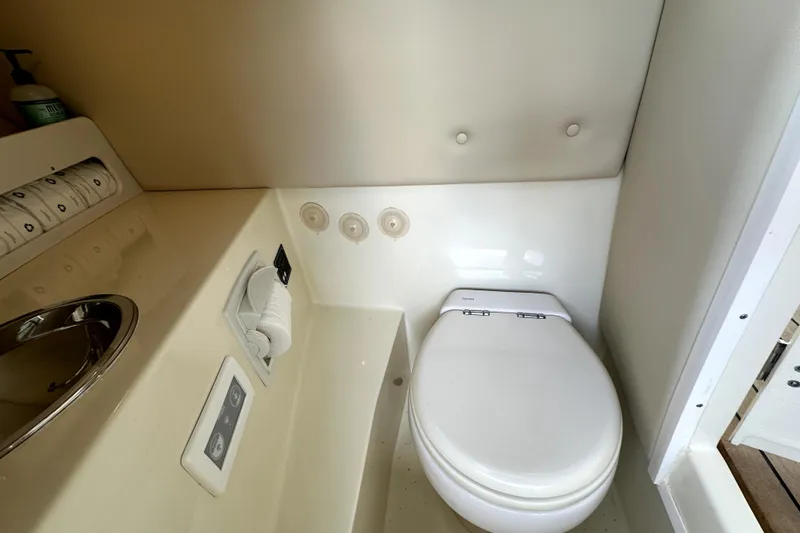Slide: The Image of 2019 Chris-Craft Launch 30 boat bathroom with toilet and sink. - 15