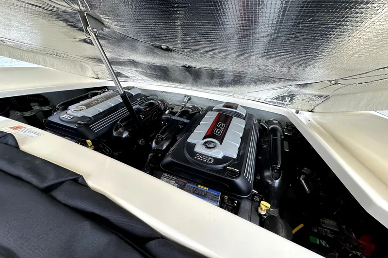 Slide: The Image of Engine compartment of 2019 Chris-Craft Launch 30, featuring dual 6.2L engines. - 16