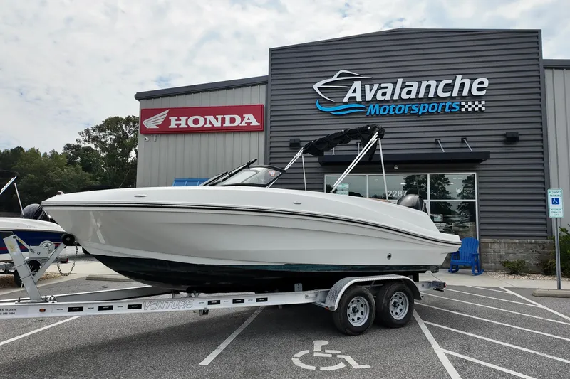 The Image of 2021 Bayliner VR5 Bowrider OB on trailer at Avalanche Motorsports dealership. - 0