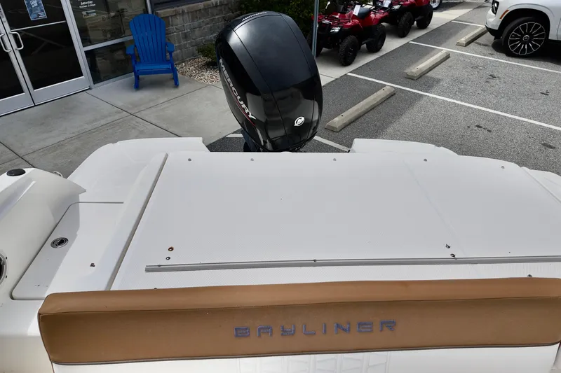 Slide: The Image of 2021 Bayliner VR5 Bowrider OB with Mercury outboard motor in parking lot. - 3