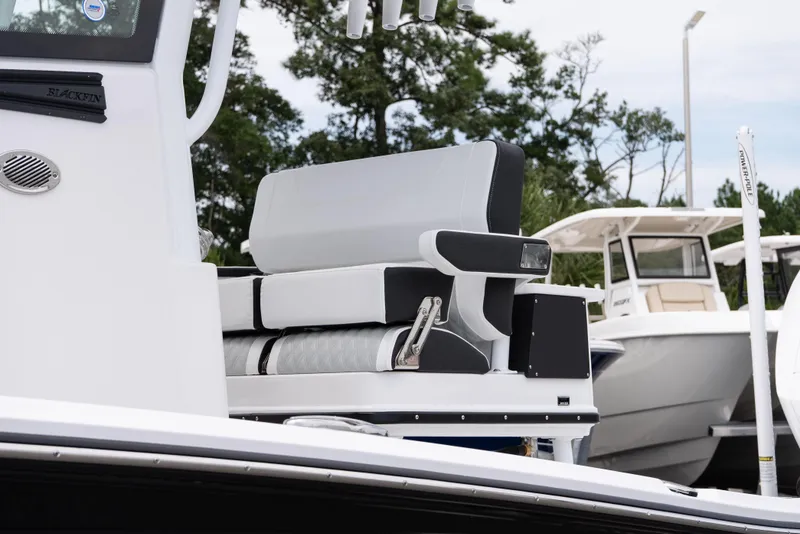 Slide: The Image of 2026 Blackfin 262 HB boat with sleek seating and modern design. - 13