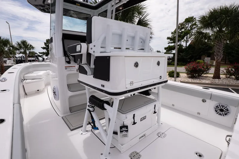 Slide: The Image of 2026 Blackfin 262 HB boat interior with seating and storage, featuring modern design elements. - 19