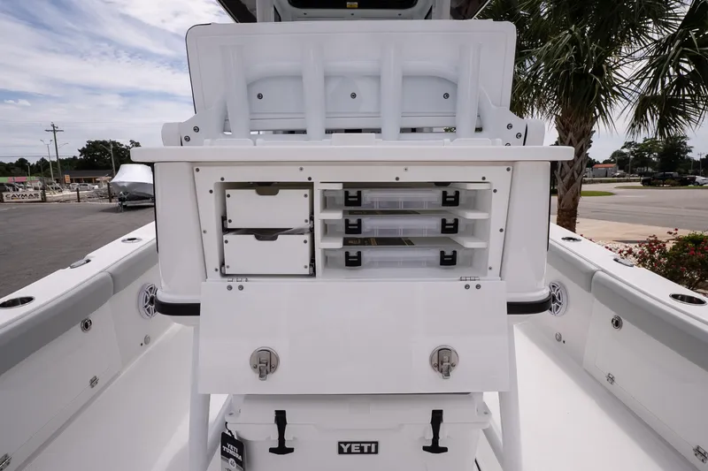 Slide: The Image of 2026 Blackfin 262 HB boat interior with storage compartments and Yeti cooler. - 20