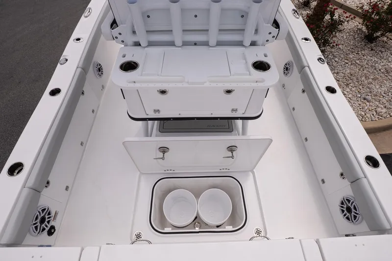 Slide: The Image of 2026 Blackfin 262 HB boat interior with storage compartments and seating. - 21