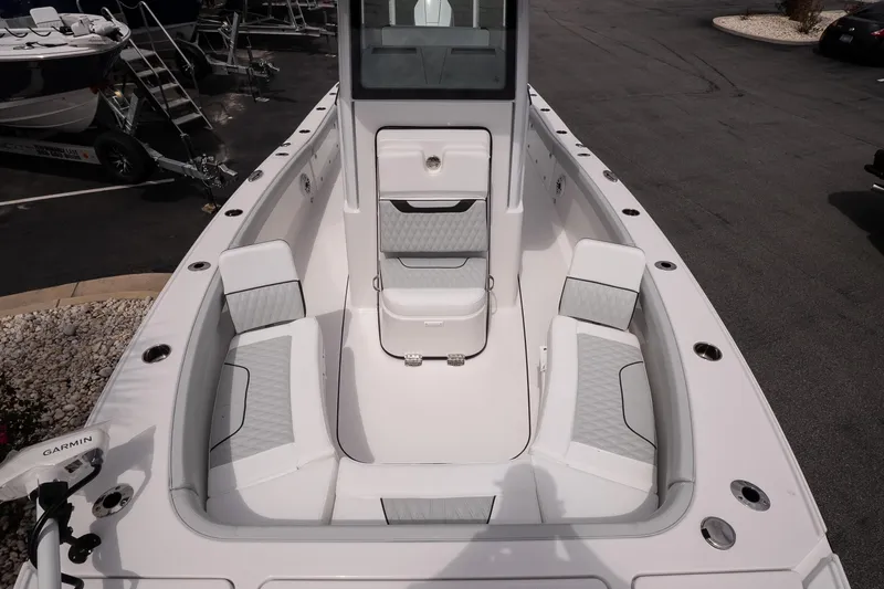 Slide: The Image of 2026 Blackfin 262 HB boat interior with cushioned seating and storage compartments. - 30