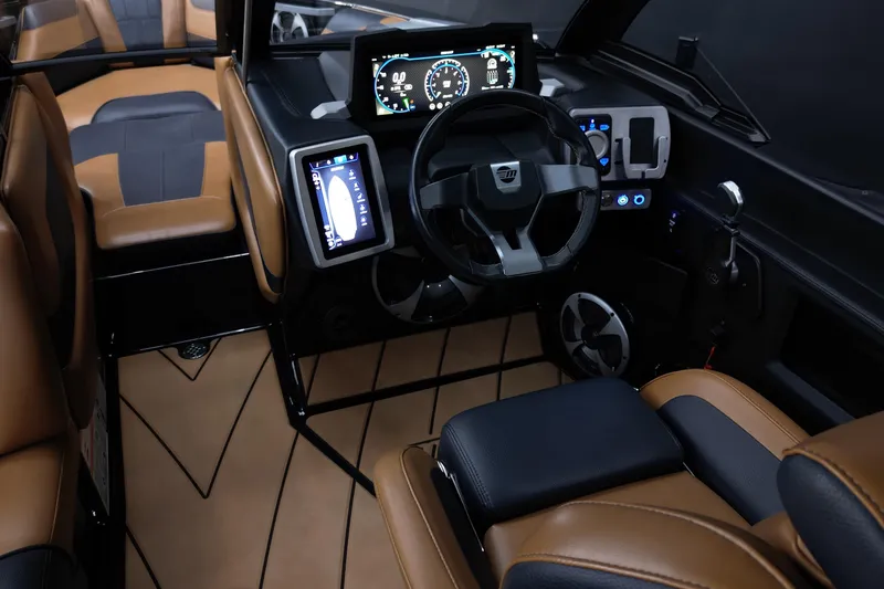 Slide: The Image of 2021 Malibu Wakesetter 20 VTX interior with modern dashboard and luxurious seating. - 13