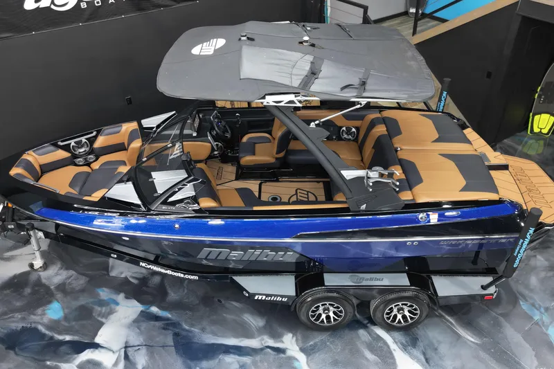 Slide: The Image of 2021 Malibu Wakesetter 20 VTX boat with sleek design and luxurious interior. - 17