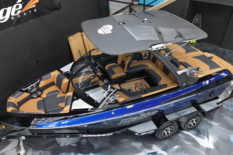 Slide: The Image of 2021 Malibu Wakesetter 20 VTX boat with sleek design and luxurious interior. - 18