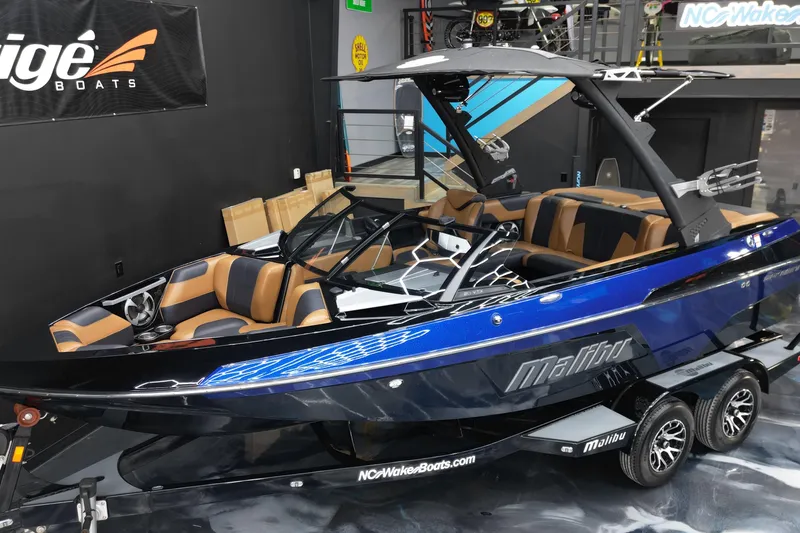 Slide: The Image of 2021 Malibu Wakesetter 20 VTX boat with sleek design and luxurious interior. - 4