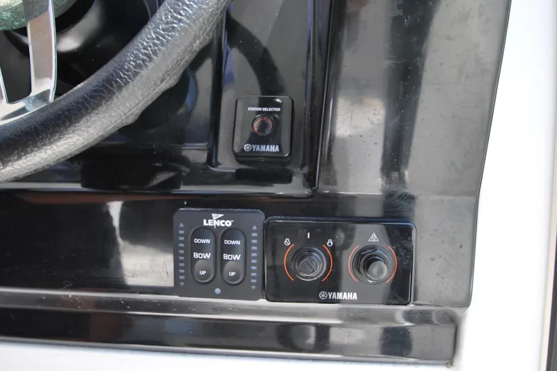 Slide: The Image of Control panel of 2019 Jeanneau NC 795 Sport with Yamaha and Lenco controls. - 13