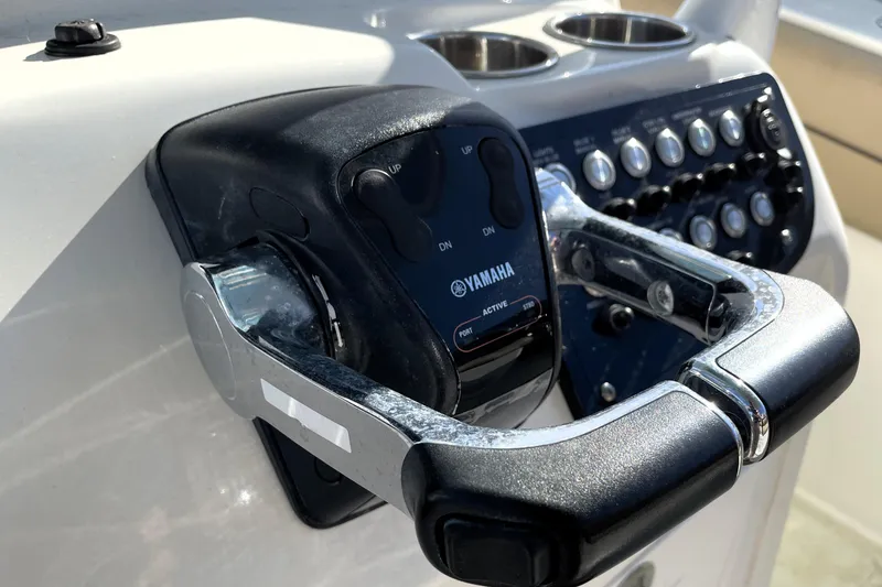 Slide: The Image of Close-up of Yamaha throttle control on 2020 NauticStar 28 XS boat dashboard. - 22
