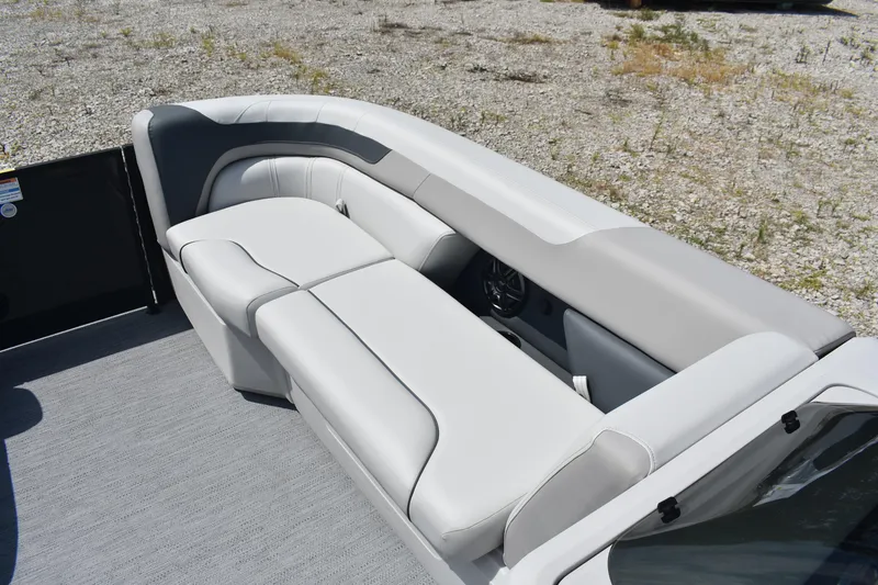 Slide: The Image of 2026 Godfrey SWEETWATER 2086SB boat interior with sleek, modern seating design. - 10