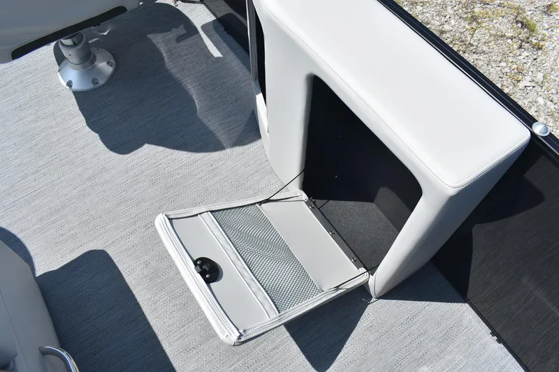 Slide: The Image of 2026 Godfrey SWEETWATER 2086SB boat interior with open storage compartment. - 16