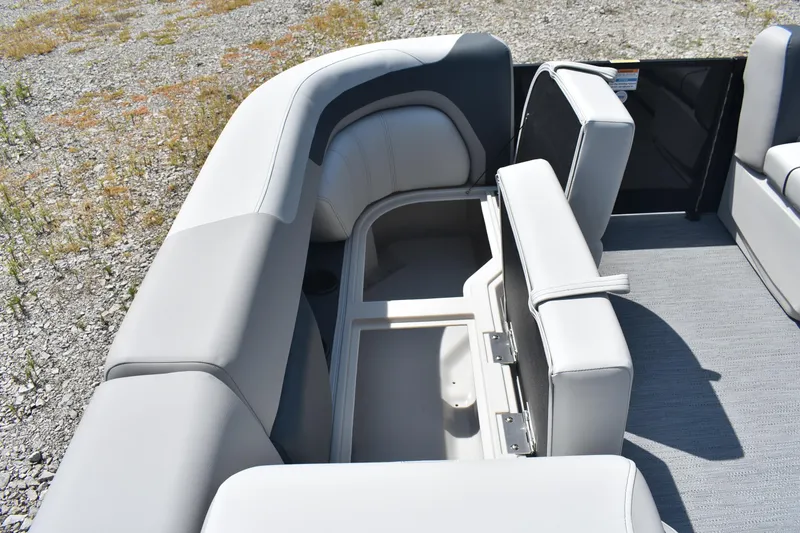 Slide: The Image of 2026 Godfrey SWEETWATER 2086SB boat interior with open storage compartment. - 17