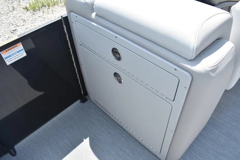 Slide: The Image of 2026 Godfrey SWEETWATER 2086SB boat seat with storage compartments and safety notice. - 18