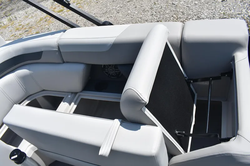 Slide: The Image of 2026 Godfrey SWEETWATER 2086SB boat interior with open storage compartment. - 22