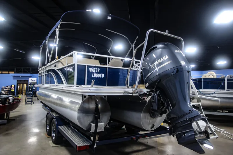 Slide: The Image of 2015 Bennington 24 SSLX pontoon boat with Yamaha engine in showroom. - 5