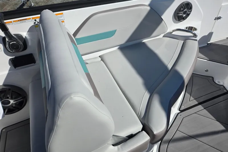 Slide: The Image of 2026 Hurricane SunDeck 235 OB boat interior with gray seating and modern design. - 23