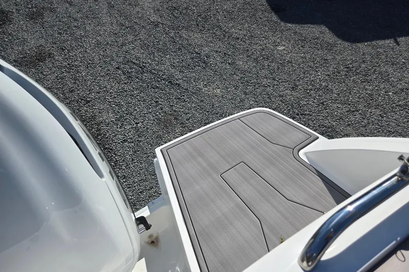 Slide: The Image of 2026 Hurricane SunDeck 235 OB boat deck with sleek design and modern finish. - 30