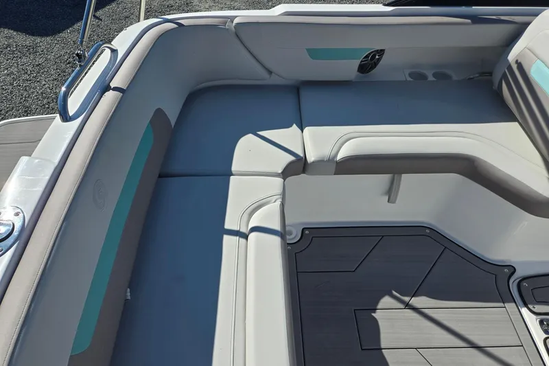 Slide: The Image of Interior seating of 2026 Hurricane SunDeck 235 OB boat, featuring modern design and comfortable upholstery. - 34