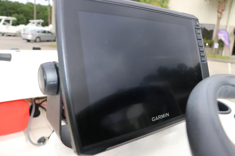 Slide: The Image of Garmin display on 2023 Mako Pro Skiff 13 CC boat dashboard. - 13
