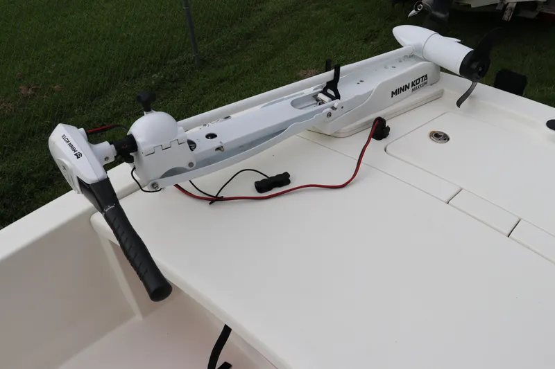 Slide: The Image of 2023 Mako Pro Skiff 13 CC with Minn Kota trolling motor on deck. - 16