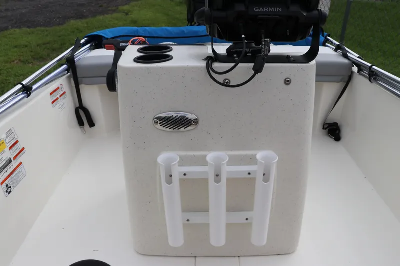 Slide: The Image of 2023 Mako Pro Skiff 13 CC boat console with rod holders and Garmin device. - 18