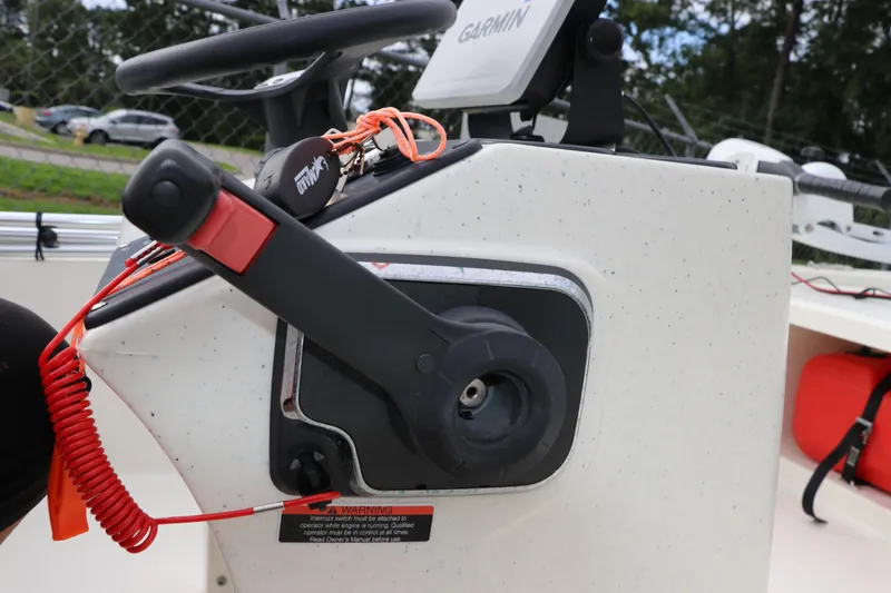 Slide: The Image of Close-up of 2023 Mako Pro Skiff 13 CC boat controls with Garmin device. - 20