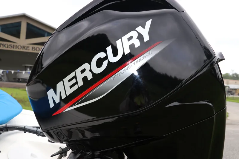 Slide: The Image of Mercury FourStroke engine on 2023 Mako Pro Skiff 13 CC boat at dealership. - 7