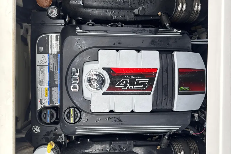 Slide: The Image of 2023 Searay SPX 210 IO engine, MerCruiser 4.5L, 200 horsepower, detailed view. - 27