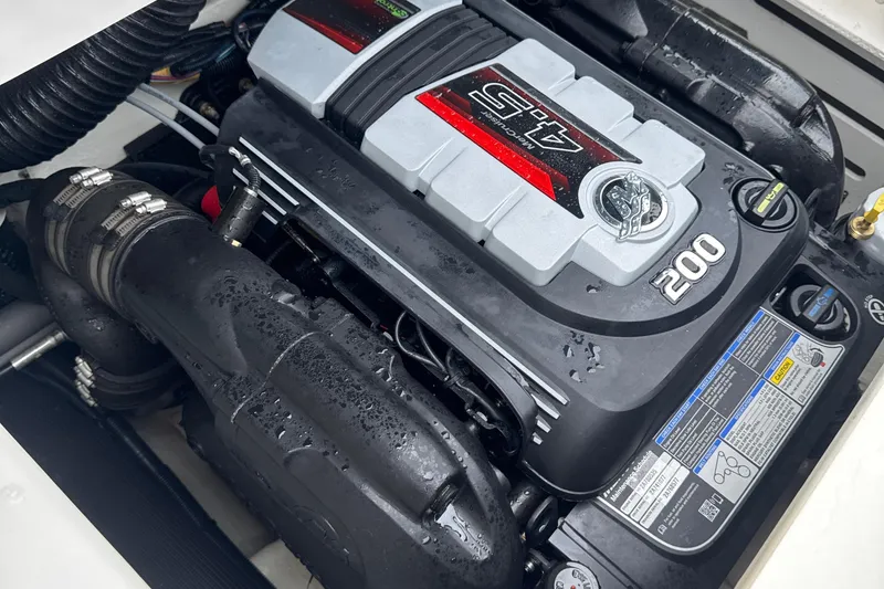 Slide: The Image of 2023 Searay SPX 210 IO engine, featuring a powerful 4.5L 200 horsepower motor. - 29