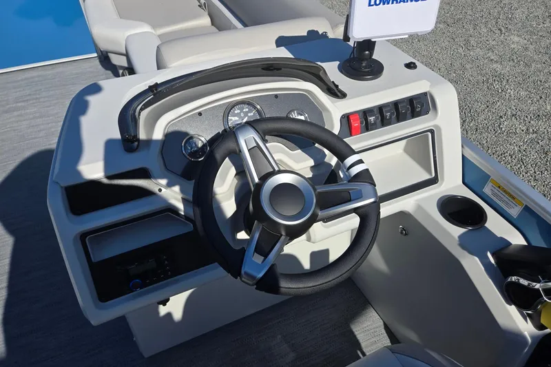 Slide: The Image of Steering console of 2026 Godfrey Xperience 2286 SBX boat with modern controls. - 16