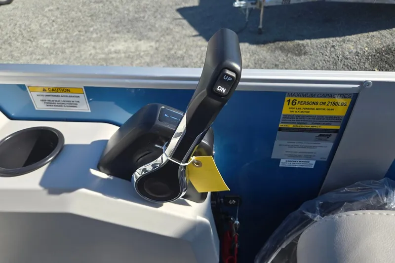 Slide: The Image of Control lever on 2026 Godfrey Xperience 2286 SBX boat, capacity label visible. - 21