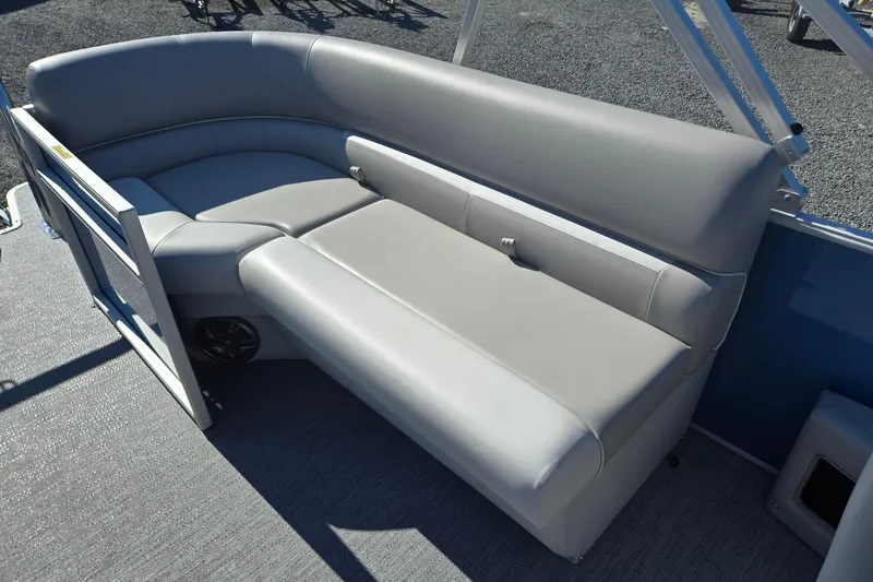 Slide: The Image of 2026 Godfrey Xperience 2286 SBX boat interior with gray seating and spacious layout. - 23
