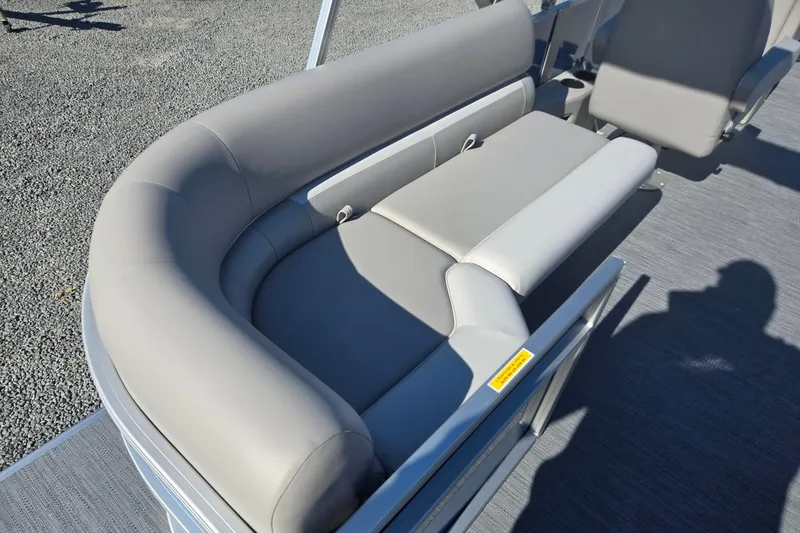 Slide: The Image of 2026 Godfrey Xperience 2286 SBX boat with comfortable gray seating. - 30