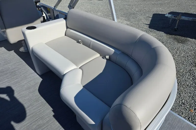 Slide: The Image of 2026 Godfrey Xperience 2286 SBX boat interior with gray cushioned seating. - 31